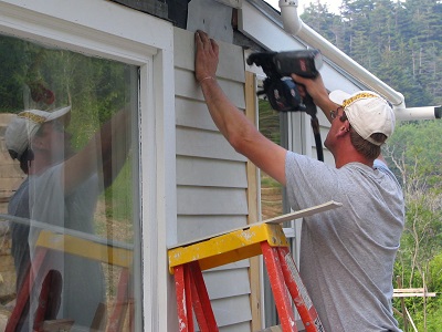 Kole working on a house