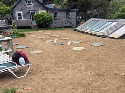 Filled and smoothed ground around septic tanks