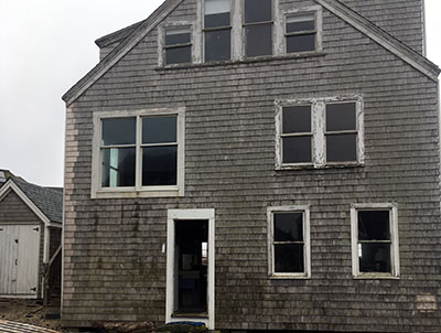 Side of building with several windows